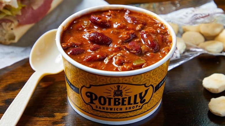 Potbelly chili with white spoon