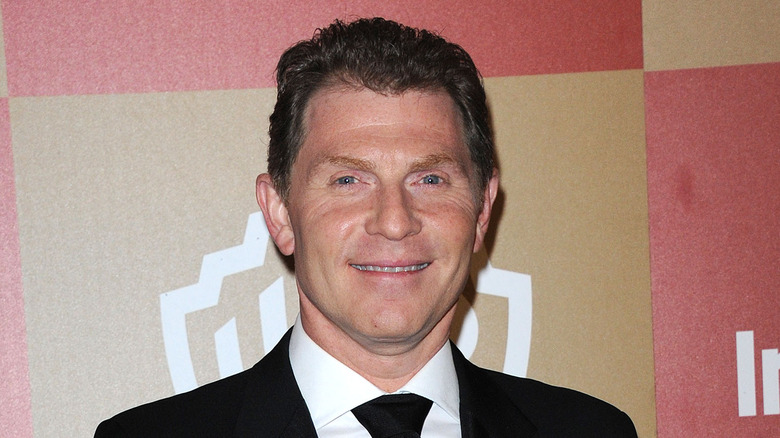 Bobby Flay posing at event