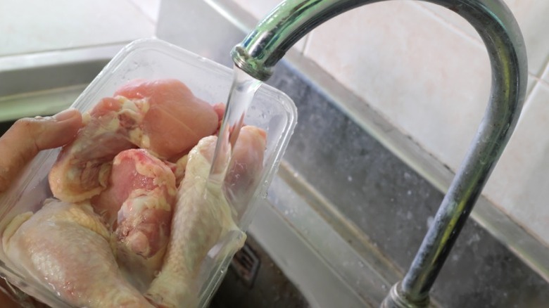 Thawing chicken in sink