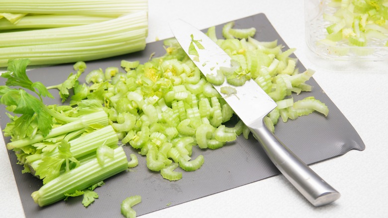 Chopped celery on cutting board