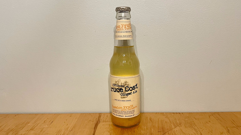 Bottle of Bruce Cost ginger ale with sediment in bottom