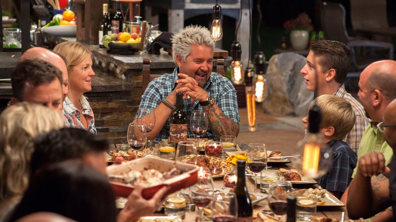 Guy Fieri with family at dinner table