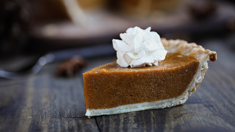 Pumpkin pie with whipped cream