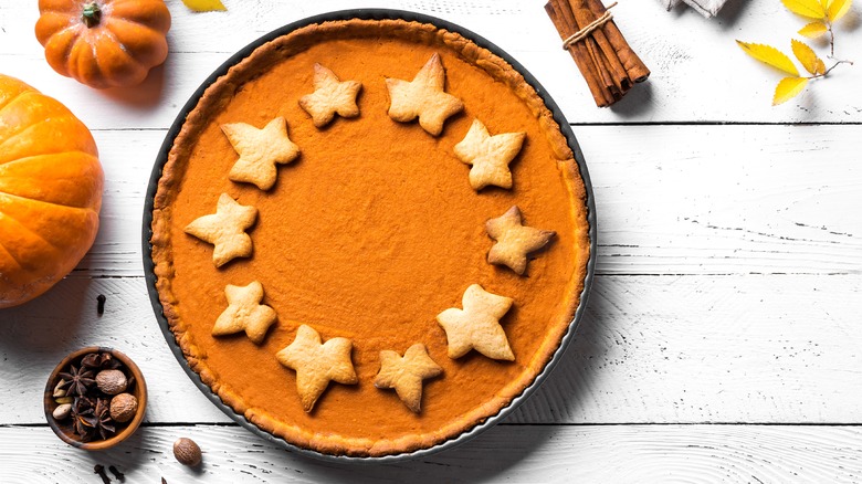 Pumpkin pie with decorative leaves