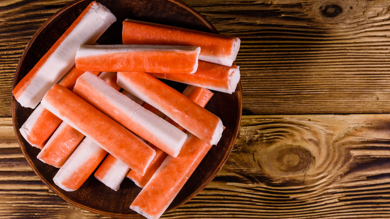 crab sticks in wooden dish