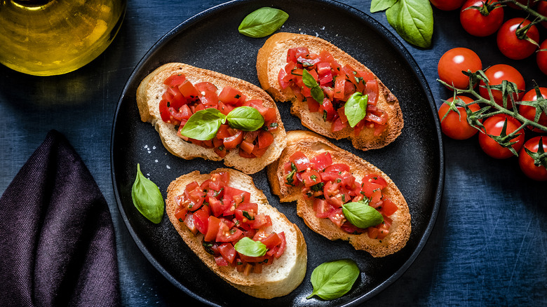 Bruschetta slices with tomatoes