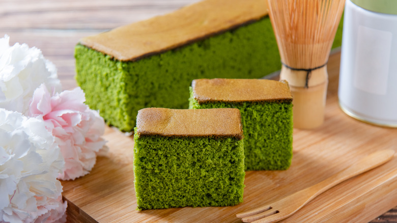 Green sponge cake on board