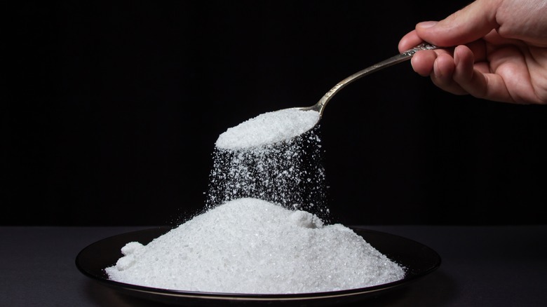 Salt pouring into a bowl