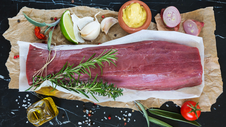 Beef tenderloin on butcher paper