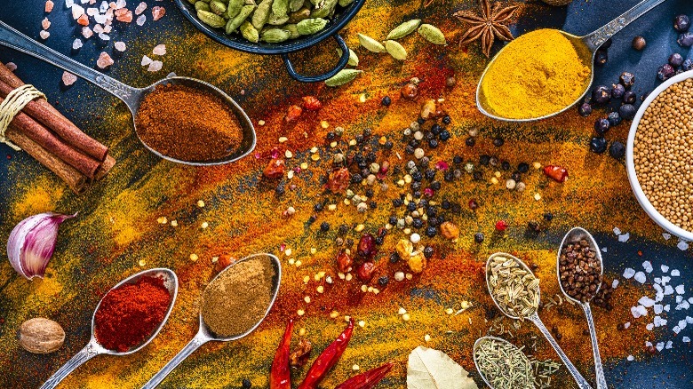 various spices in spoons