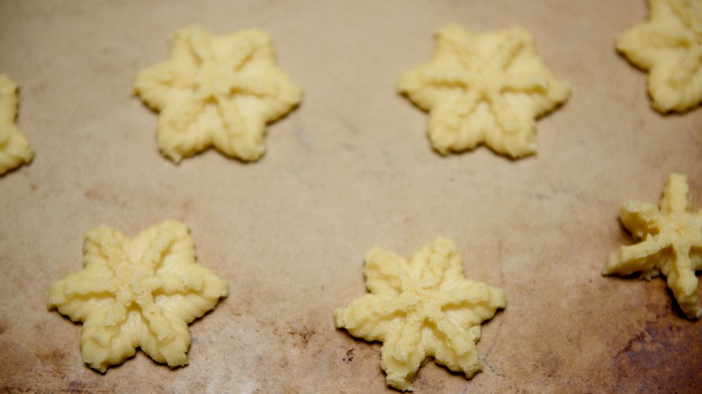 Spritz cookies on baking sheet