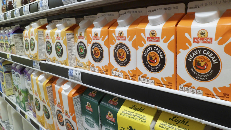 Cream cartons on store shelf