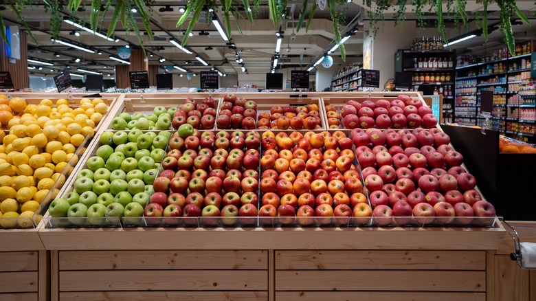 Assorted apples at grocery store