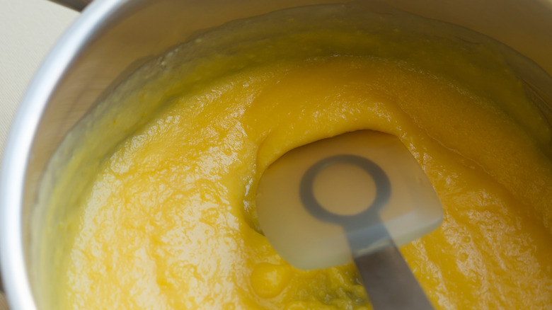 Spatula stirring lemon curd