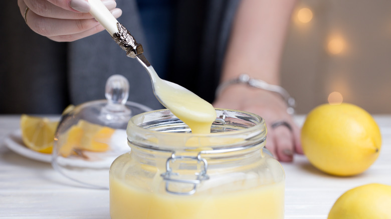 Person serving lemon curd