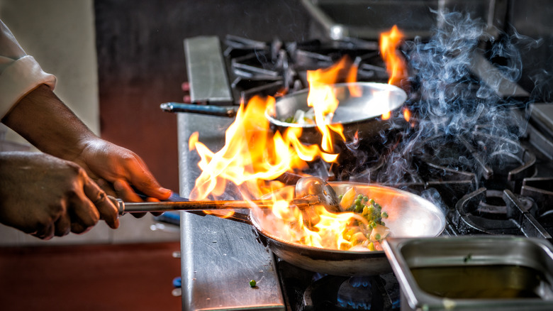 food flambeing in frying pan