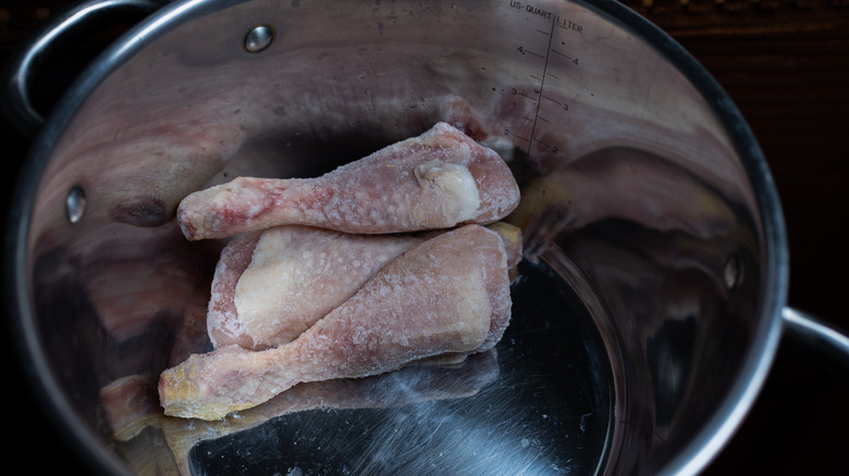 frozen chicken legs in pan