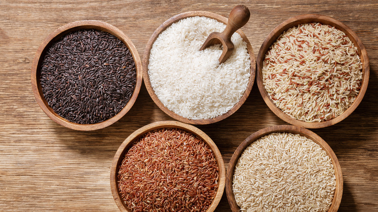 Bowls of different rice varieties