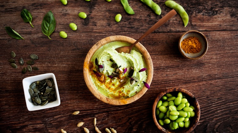 guacamole with pumpkin seeds and edamame