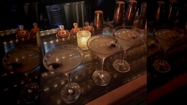 Three martinis on bar