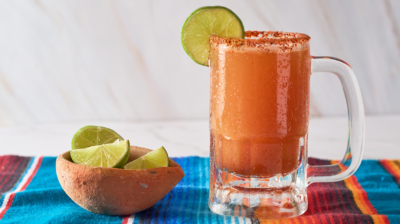 michelada with lime and Tajín