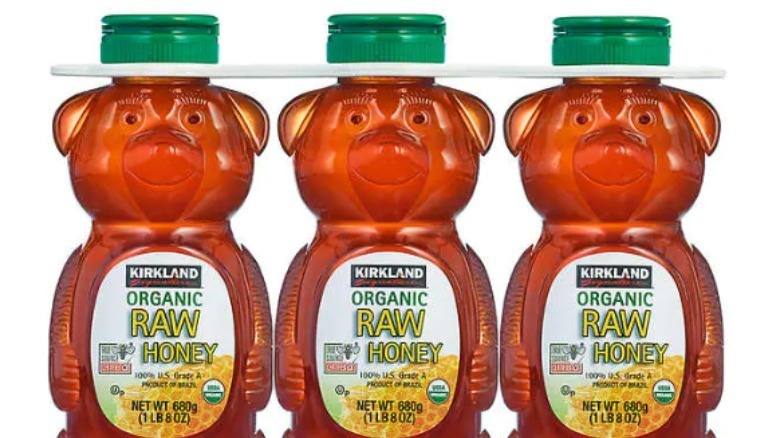 Three bottles of raw honey