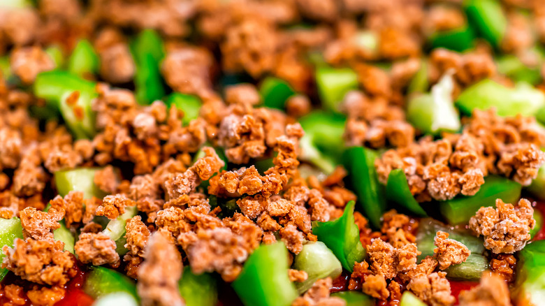 Ground soy crumbles and chopped peppers