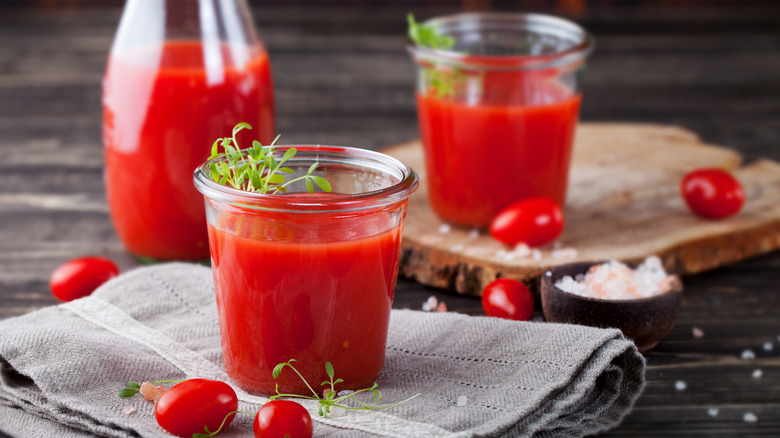 Tomato cocktail on wooden table