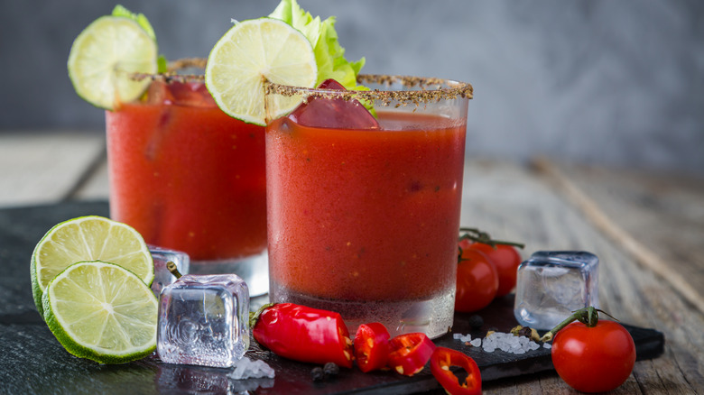 Two red cocktails on platter