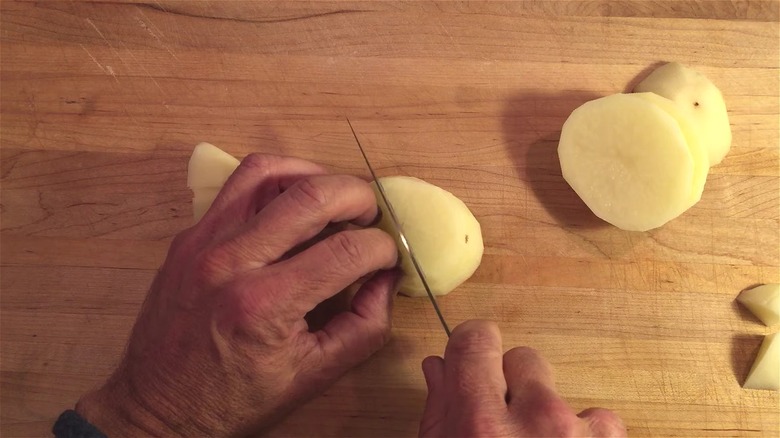 Alton brown chopping potatoes