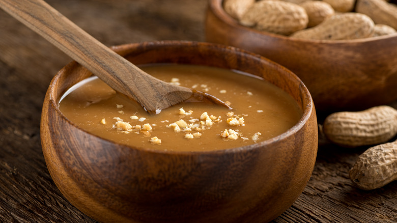 peanut sauce in wooden bowl