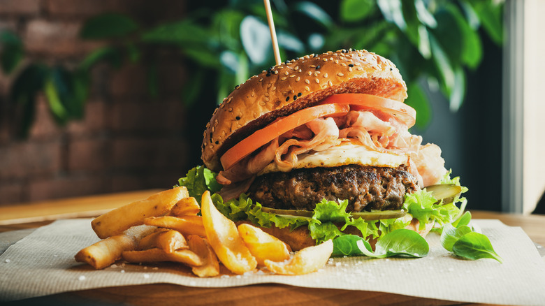 Restaurant hamburger and fries.