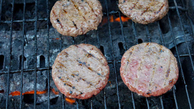 Burgers cooking on grill