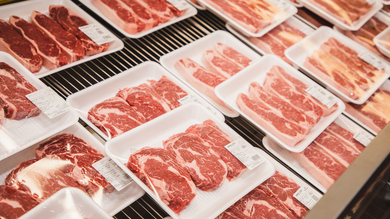 Packages of meat in grocery store