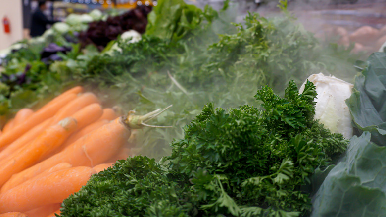 carrots being misted in store