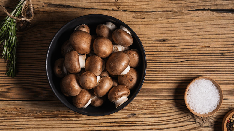 Bowls of mushrooms and salt