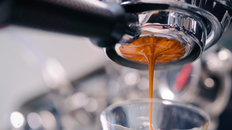 making espresso in glass