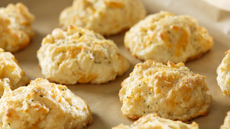 Golden cheddar biscuits on tray