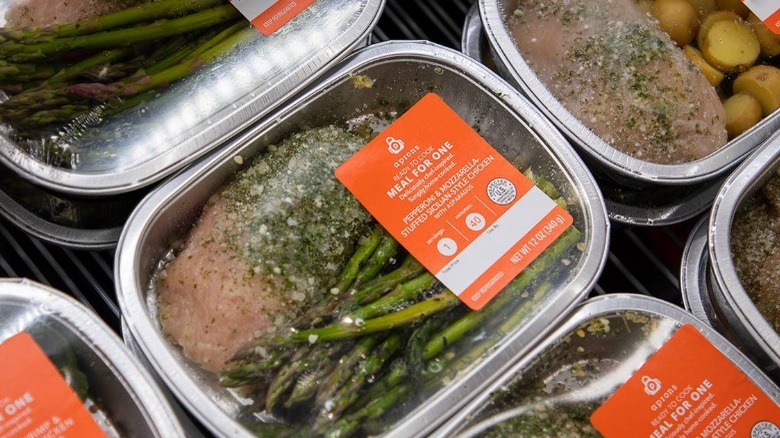 Prepackaged meal kit with meat and vegetables