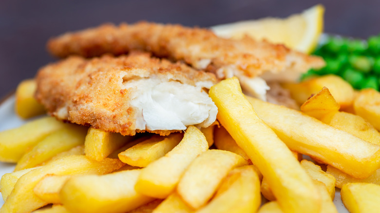 fried fish with french fries and peas