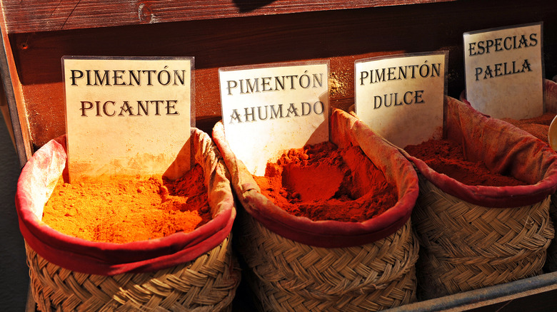 Baskets of different paprikas