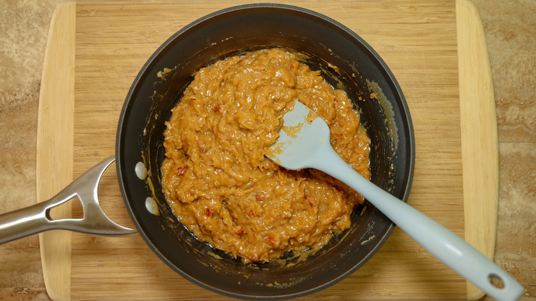 Coconut pecan frosting in pan