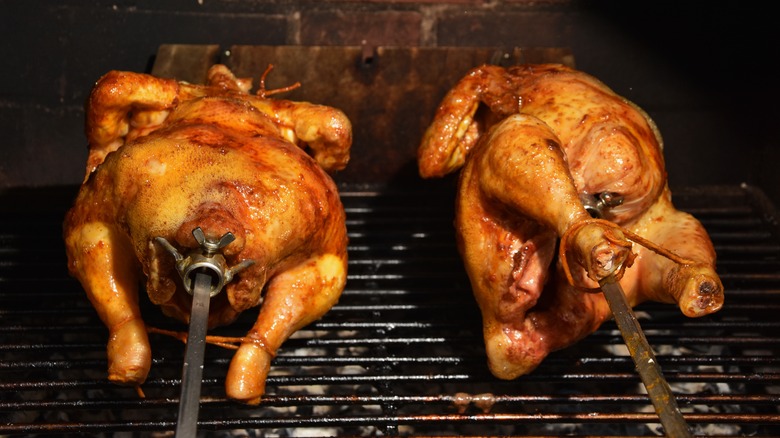 rotisserie chickens on spits