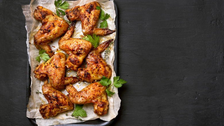 chicken wings on baking sheet