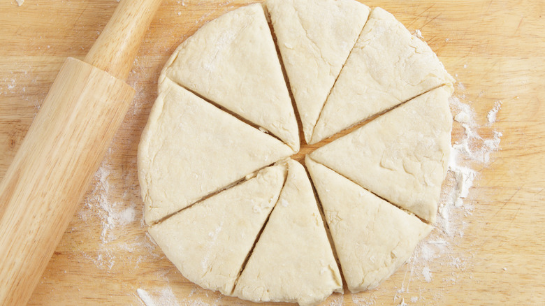 Rolling pin and cut dough