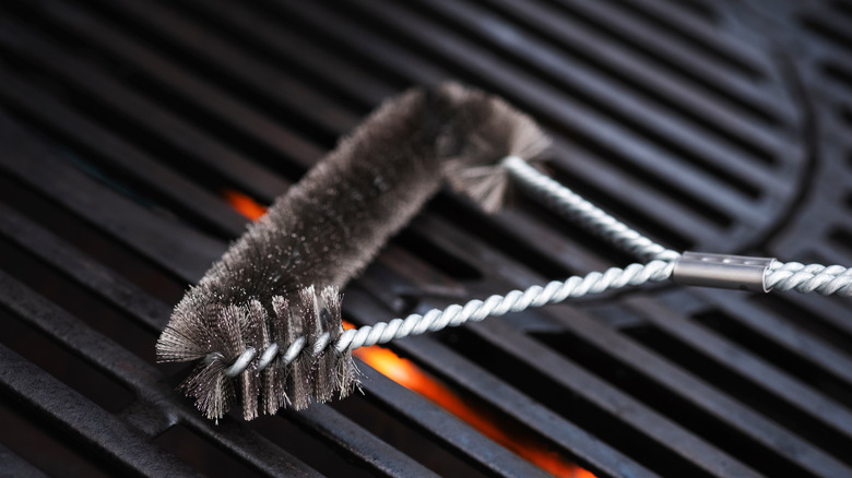 Close up cleaning charcoal grill