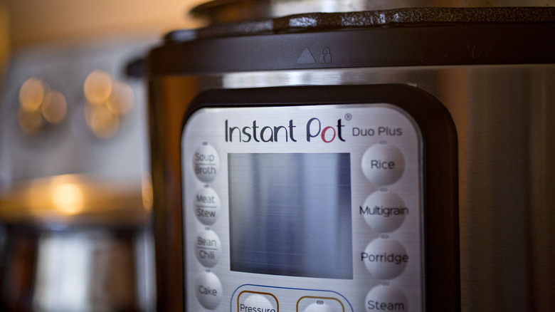 Instant Pot with stove in background