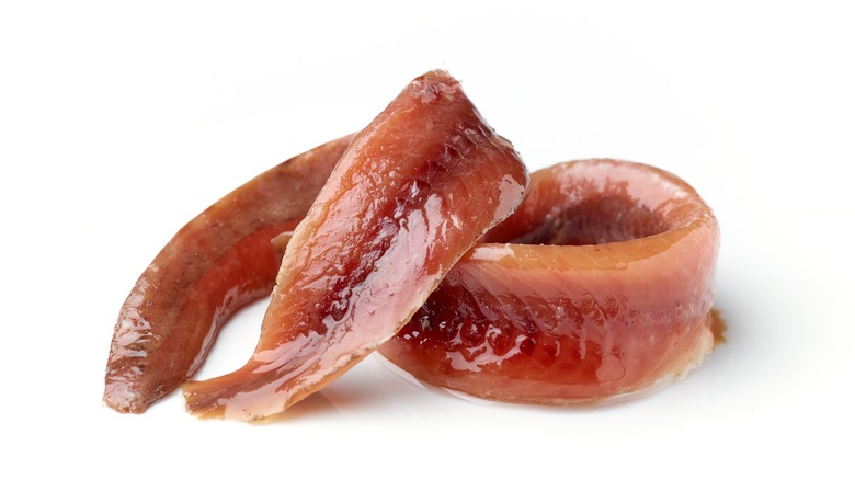 Anchovy filets on white background