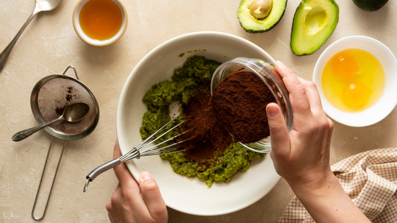 Mixing ingredients for avocado brownies