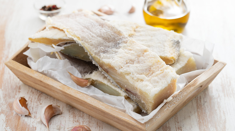 salted cod on wood plate